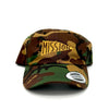 Camouflage baseball cap with 'Mission' logo on a white background