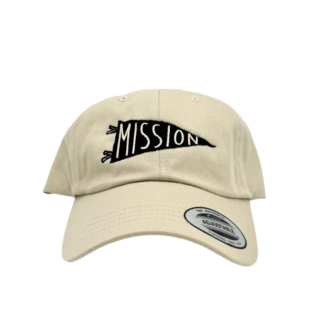 Beige cap with 'Mission' logo on a white background